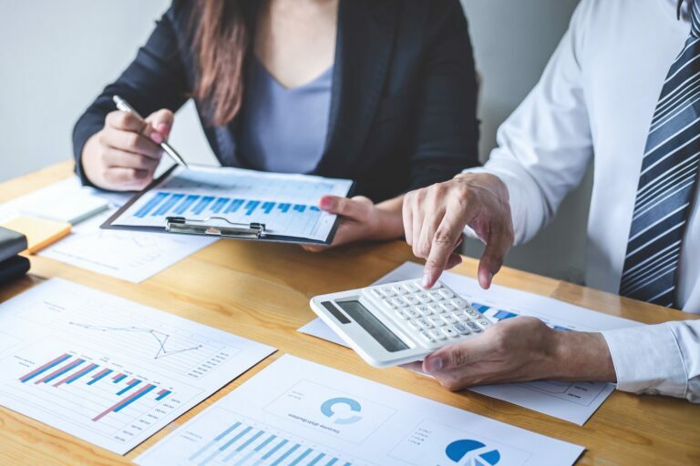 Business colleague team working and analyzing with new project of accounting finance